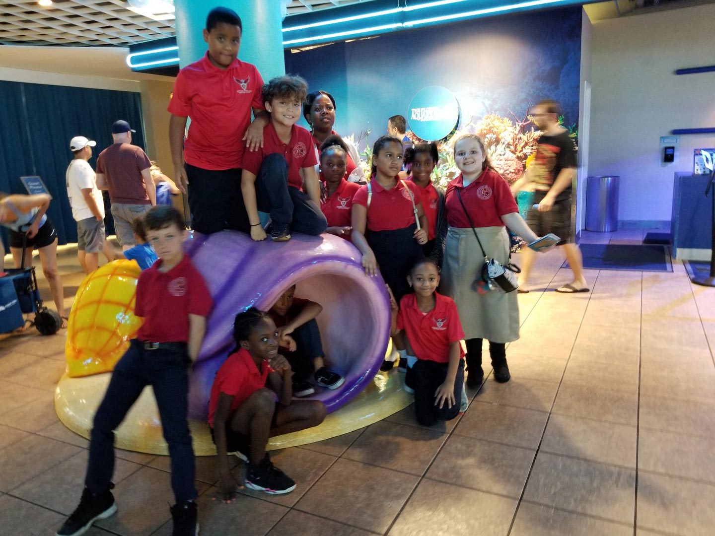 Photo Of FSCA Kids On Purple Yellow Object